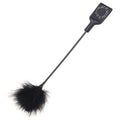 Fusta con brillos y pom pom